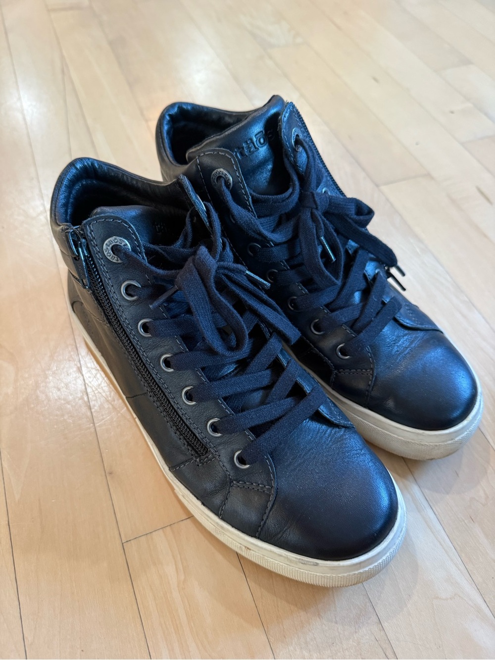 Taos Women’s Black Leather Zip High Top Sneakers